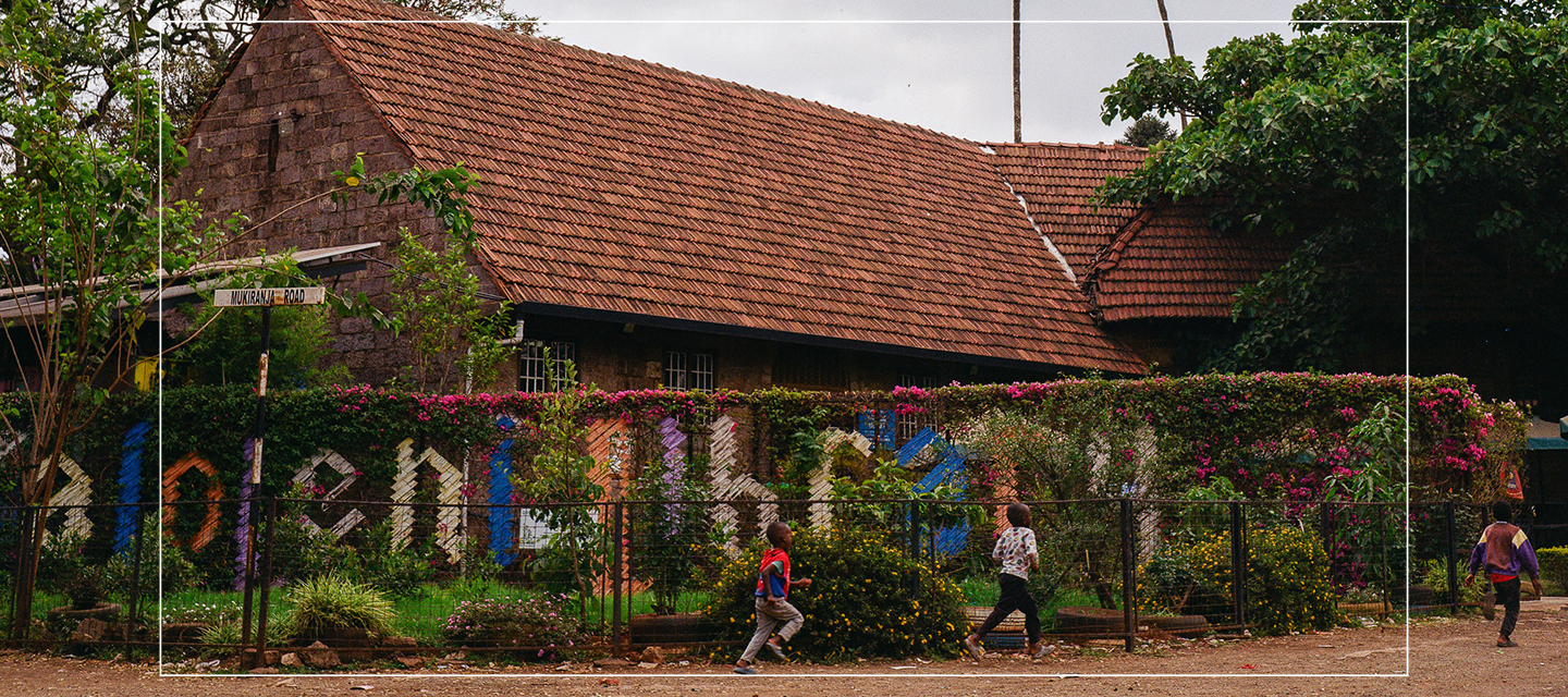 Children walking past Kaloleni Social Hall